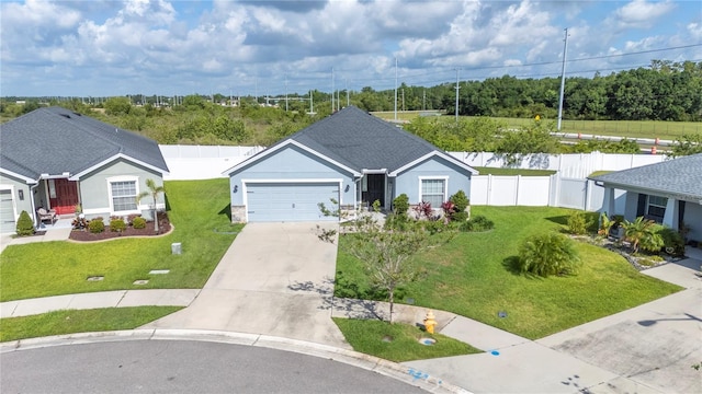 3883 Sandhill Crane Dr, Lakeland, FL 33811 - ranch-style house with an attached garage and driveway
