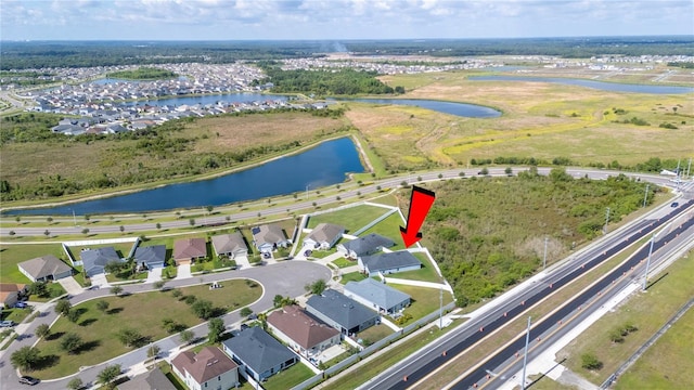 3883 Sandhill Crane Dr, Lakeland, FL 33811 - aerial view of property's location featuring a large body of water and nearby suburban area