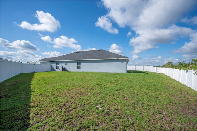 3883 Sandhill Crane Dr, Lakeland, FL 33811 - rear view of house featuring stucco siding