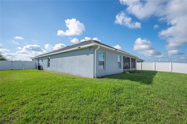 3883 Sandhill Crane Dr, Lakeland, FL 33811 - rear view of property featuring stucco siding
