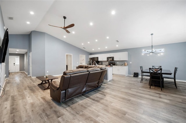 3883 Sandhill Crane Dr, Lakeland, FL 33811 - living area with ceiling fan, light wood-style flooring, baseboards, a chandelier, and recessed lighting