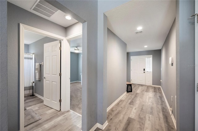 3883 Sandhill Crane Dr, Lakeland, FL 33811 - corridor with light wood-style floors and baseboards