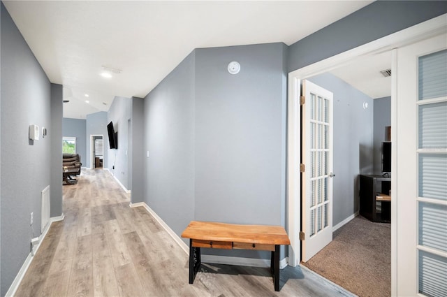 3883 Sandhill Crane Dr, Lakeland, FL 33811 - corridor featuring wood finished floors and baseboards