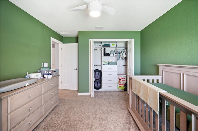3883 Sandhill Crane Dr, Lakeland, FL 33811 - bedroom with a closet, light carpet, and a ceiling fan