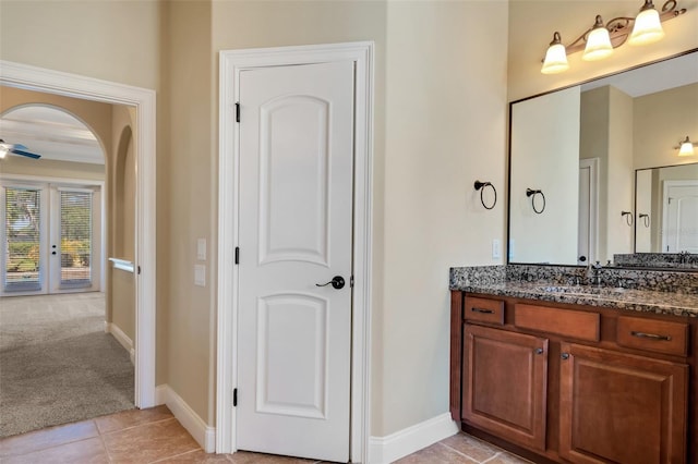 6527 Eagle Ridge Way, Lakeland, FL 33813 - bathroom featuring vanity, tile patterned flooring, french doors, and a ceiling fan