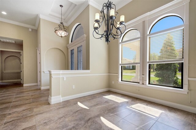 6527 Eagle Ridge Way, Lakeland, FL 33813 - unfurnished dining area featuring ornamental molding, a chandelier, a towering ceiling, and tile patterned flooring
