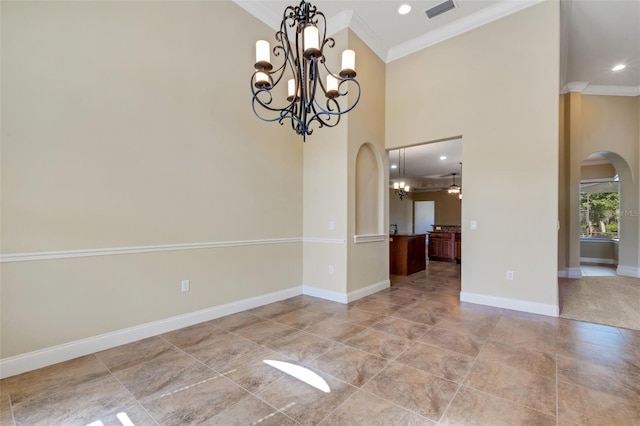 6527 Eagle Ridge Way, Lakeland, FL 33813 - unfurnished dining area with arched walkways, a chandelier, crown molding, high vaulted ceiling, and light tile patterned flooring
