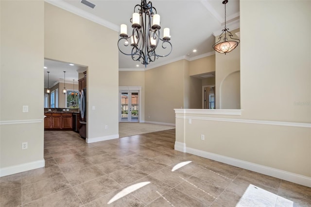 6527 Eagle Ridge Way, Lakeland, FL 33813 - unfurnished dining area with crown molding, french doors, a chandelier, recessed lighting, and a high ceiling