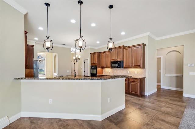 6527 Eagle Ridge Way, Lakeland, FL 33813 - kitchen featuring black appliances, dark stone counters, backsplash, crown molding, and decorative light fixtures