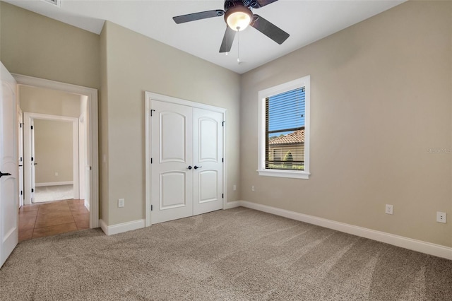 6527 Eagle Ridge Way, Lakeland, FL 33813 - unfurnished bedroom with carpet flooring, a closet, and ceiling fan