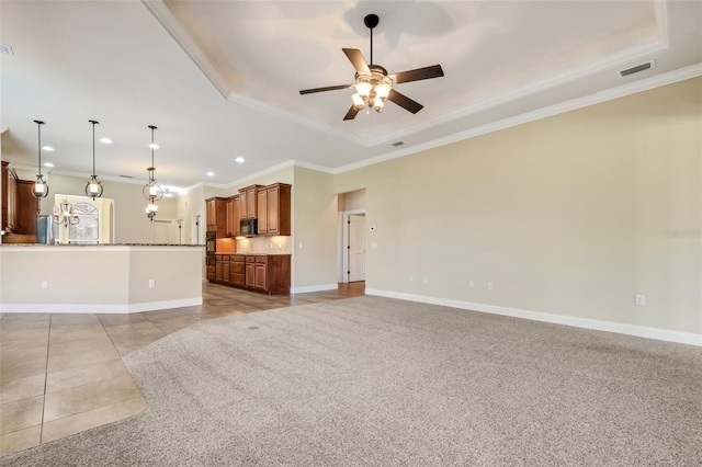 6527 Eagle Ridge Way, Lakeland, FL 33813 - unfurnished living room with a raised ceiling, recessed lighting, crown molding, ceiling fan, and light tile patterned flooring