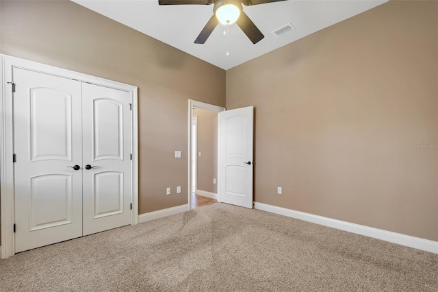 6527 Eagle Ridge Way, Lakeland, FL 33813 - unfurnished bedroom with light carpet, a closet, and ceiling fan