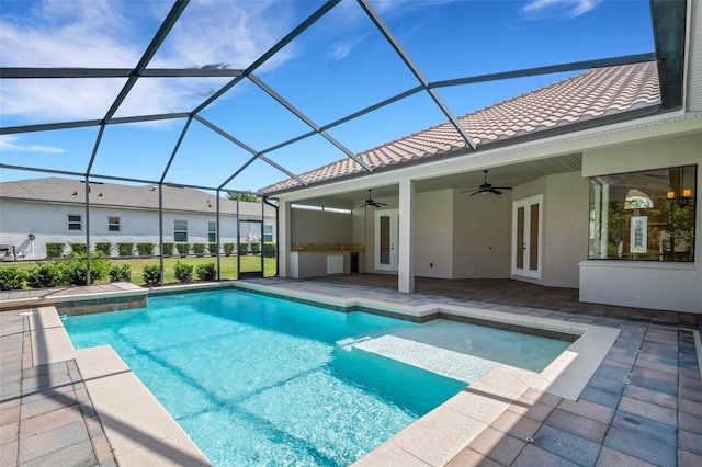 6527 Eagle Ridge Way, Lakeland, FL 33813 - outdoor pool featuring a ceiling fan, a patio, french doors, and glass enclosure
