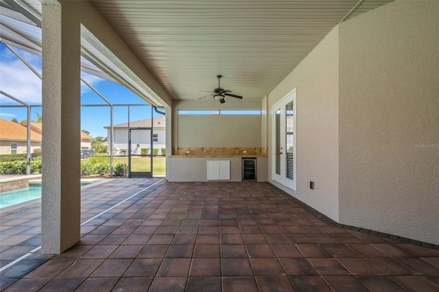 6527 Eagle Ridge Way, Lakeland, FL 33813 - view of patio featuring a ceiling fan, an outdoor pool, wine cooler, and a lanai