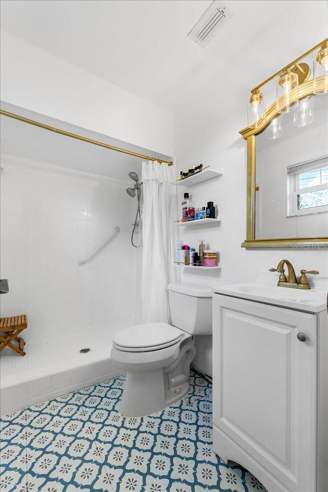 2810 Gary Ln, Lakeland, FL 33812 - bathroom with toilet, a shower with shower curtain, vanity, and tile patterned floors
