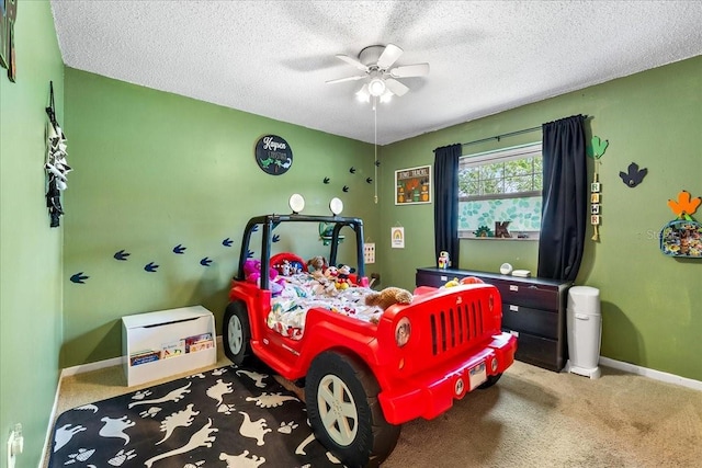 2810 Gary Ln, Lakeland, FL 33812 - bedroom with carpet flooring, a textured ceiling, baseboards, and ceiling fan