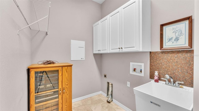 2025 Viewpoint Landings Rd, Lakeland, FL 33810 - laundry area featuring electric dryer hookup, cabinet space, hookup for a washing machine, baseboards, and light tile patterned flooring