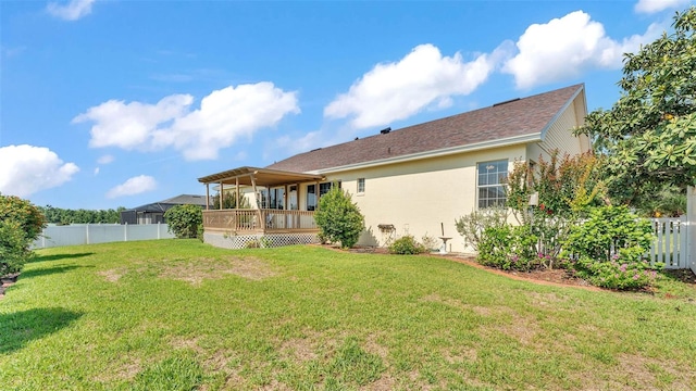 2025 Viewpoint Landings Rd, Lakeland, FL 33810 - back of house featuring a wooden deck and stucco siding
