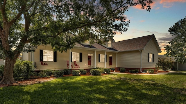 2025 Viewpoint Landings Rd, Lakeland, FL 33810 - view of front of property featuring a porch, a yard, and roof with shingles
