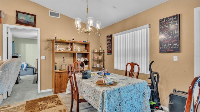 7311 Briarbay Loop, Lakeland, FL 33810 - dining space featuring a chandelier, baseboards, and light carpet