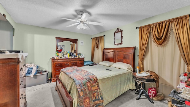 7311 Briarbay Loop, Lakeland, FL 33810 - bedroom with carpet floors, a textured ceiling, and a ceiling fan