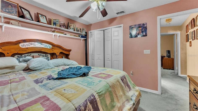 7311 Briarbay Loop, Lakeland, FL 33810 - bedroom with a closet, light carpet, ceiling fan, and baseboards