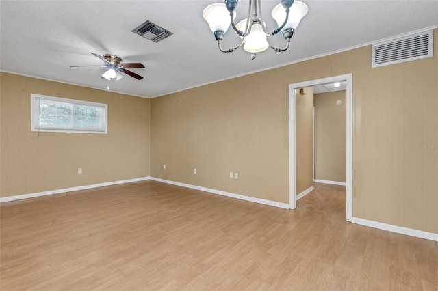 3427 S Polk Ave, Lakeland, FL 33803 - unfurnished room with light wood-style floors, a chandelier, a ceiling fan, baseboards, and ornamental molding