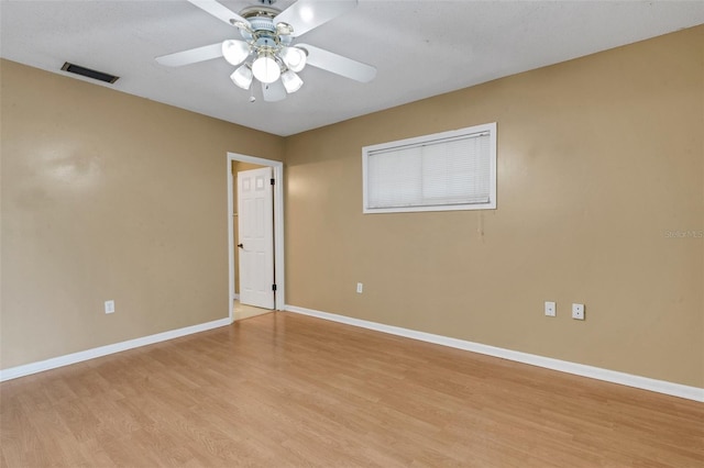 3427 S Polk Ave, Lakeland, FL 33803 - unfurnished room with light wood-style flooring, baseboards, and a ceiling fan