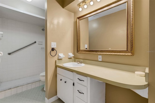3427 S Polk Ave, Lakeland, FL 33803 - full bathroom featuring toilet, vanity, tiled shower, and tile patterned floors
