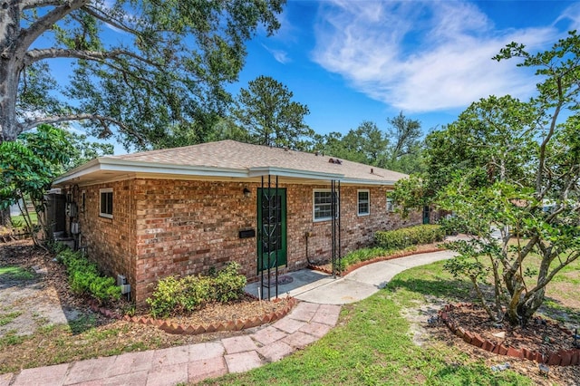 3427 S Polk Ave, Lakeland, FL 33803 - rear view of property featuring brick siding