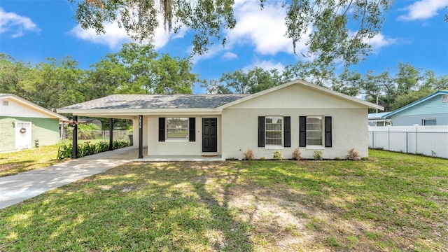 3829 Abbott Ln, Lakeland, FL 33810 - ranch-style home with driveway, an attached carport, and stucco siding