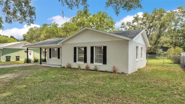 3829 Abbott Ln, Lakeland, FL 33810 - ranch-style home with a shingled roof and stucco siding