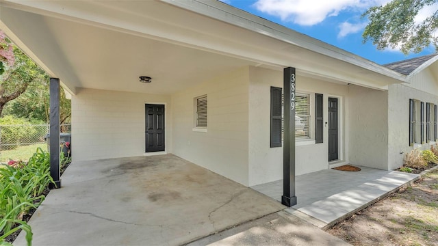 3829 Abbott Ln, Lakeland, FL 33810 - view of patio featuring an attached carport