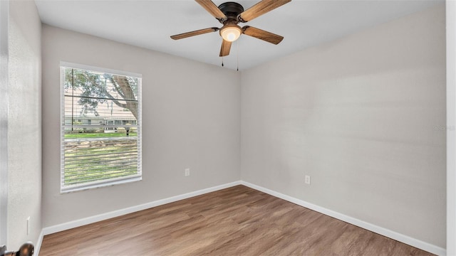 3829 Abbott Ln, Lakeland, FL 33810 - empty room featuring wood finished floors, baseboards, and a ceiling fan
