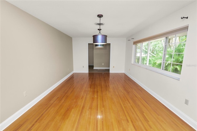 509 Rob Roy St, Lakeland, FL 33813 - unfurnished room featuring light wood-type flooring and baseboards