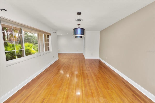 509 Rob Roy St, Lakeland, FL 33813 - spare room featuring light wood-style flooring and baseboards