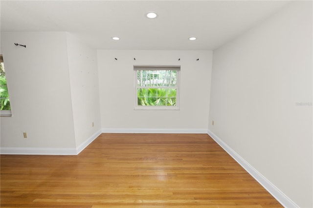 509 Rob Roy St, Lakeland, FL 33813 - unfurnished room with recessed lighting, light wood-style flooring, and baseboards