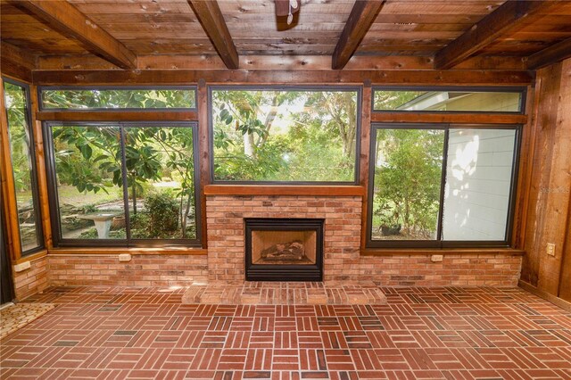 509 Rob Roy St, Lakeland, FL 33813 - unfurnished sunroom with beamed ceiling