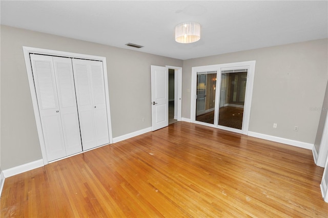 509 Rob Roy St, Lakeland, FL 33813 - unfurnished bedroom featuring baseboards and light wood-style floors