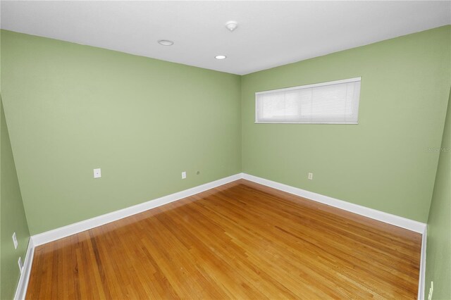 509 Rob Roy St, Lakeland, FL 33813 - spare room featuring baseboards, light wood-style flooring, and recessed lighting