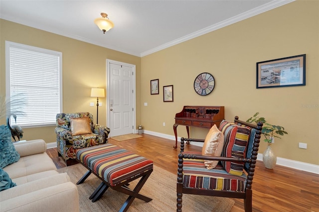 2731 Coventry Ave, Lakeland, FL 33803 - living area with baseboards, wood finished floors, and ornamental molding