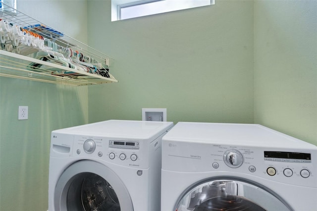 2731 Coventry Ave, Lakeland, FL 33803 - washroom with washer and clothes dryer