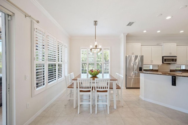 2425 Laurel Glen Dr, Lakeland, FL 33803 - dining space featuring a chandelier, ornamental molding, recessed lighting, and light tile patterned flooring