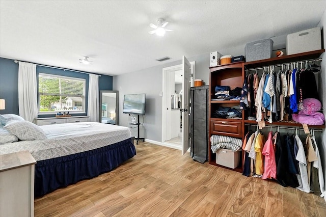 1648 Skinner St, Lakeland, FL 33801 - bedroom with light wood-style flooring and baseboards