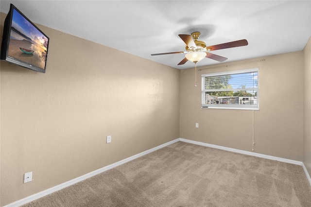 2920 Audie Combee Rd, Lakeland, FL 33801 - carpeted empty room featuring a ceiling fan and baseboards