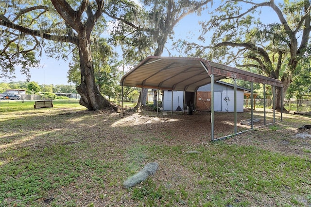 2920 Audie Combee Rd, Lakeland, FL 33801 - view of parking featuring a detached carport