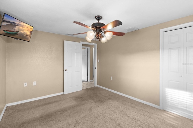 2920 Audie Combee Rd, Lakeland, FL 33801 - empty room featuring carpet, a ceiling fan, and baseboards