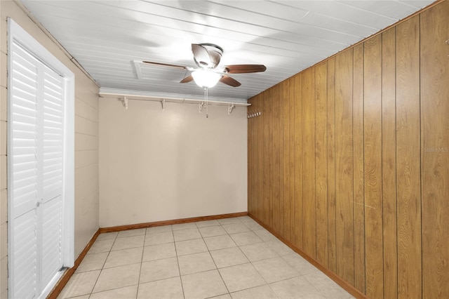 2920 Audie Combee Rd, Lakeland, FL 33801 - empty room with a ceiling fan, wood walls, and baseboards