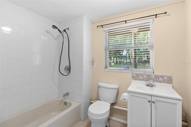 2920 Audie Combee Rd, Lakeland, FL 33801 - full bath featuring toilet, shower / tub combination, vanity, and decorative backsplash