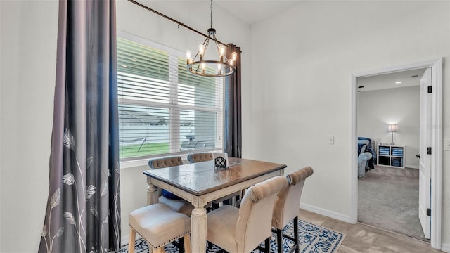 1146 Enclave Ct, Auburndale, FL 33823 - dining space with a chandelier and baseboards